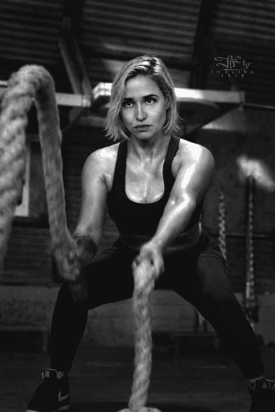 Phelicia Gomez training with battle ropes